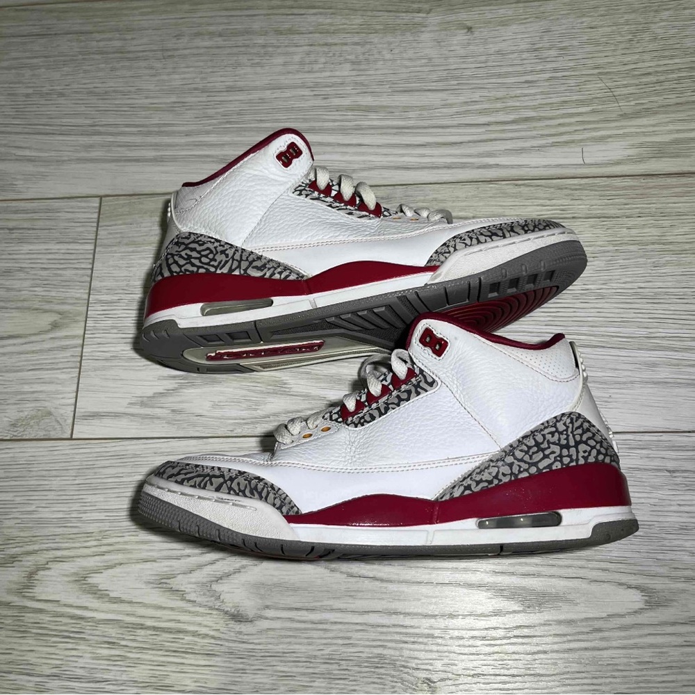 Nike White and Red Sneakers with Iconic Design
